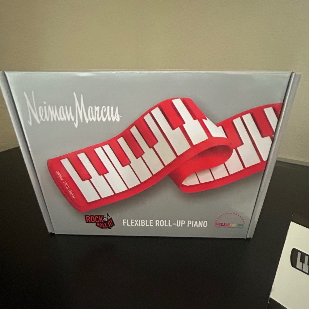 Neiman Marcus Rock & Roll It- Roll-up Piano.